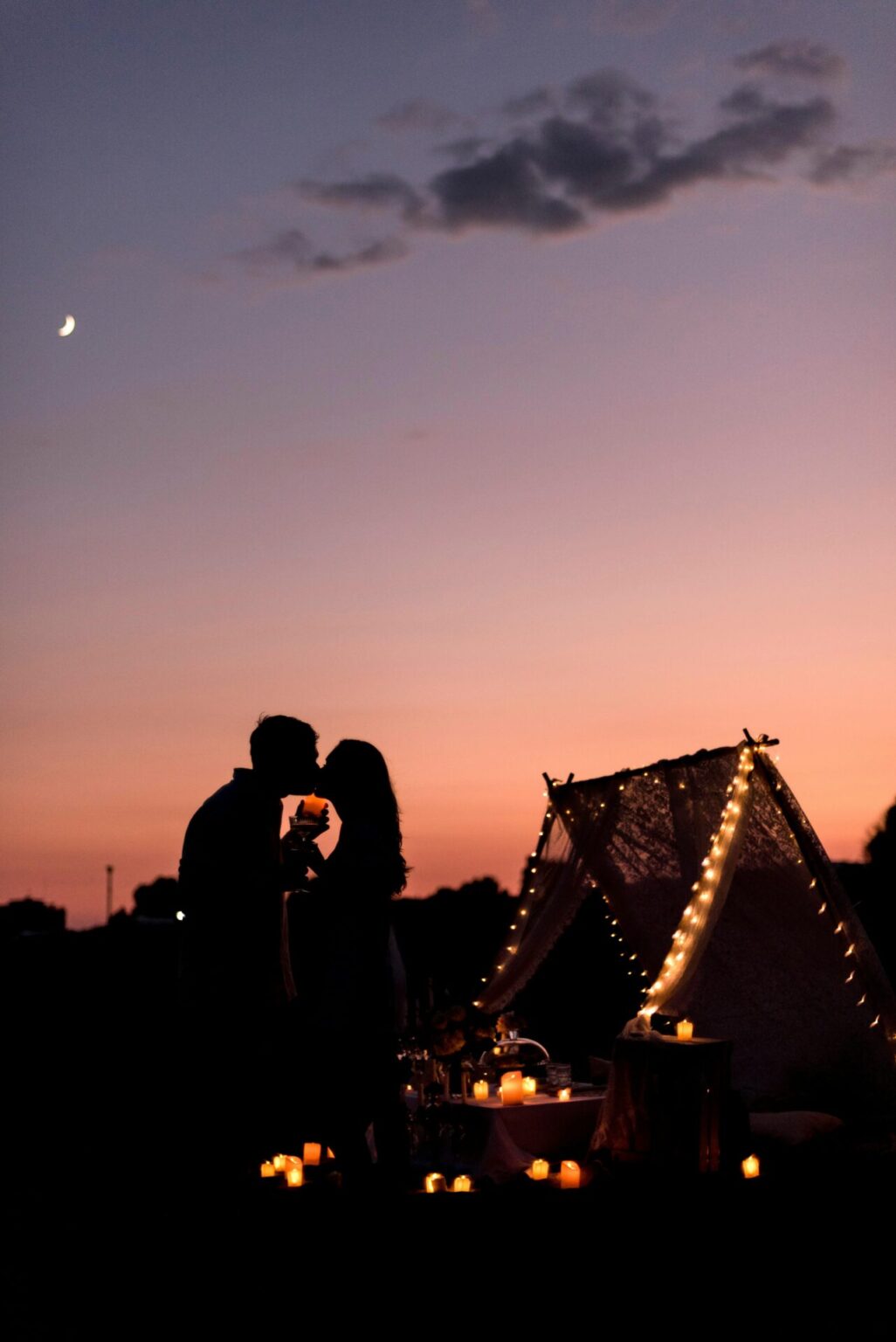 marriage proposal on the beach with sunset